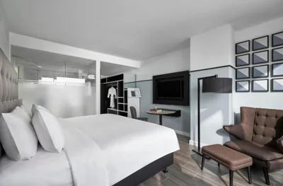 Habitación King Deluxe — M Village Hotel Tôn Thất Đạm, a brand of Modern Village Lifestyle