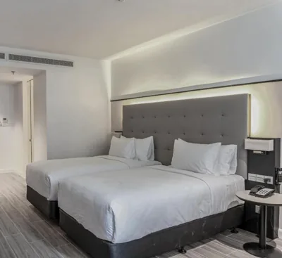 Habitación twin — M Village Hotel Tôn Thất Đạm, a brand of Modern Village Lifestyle